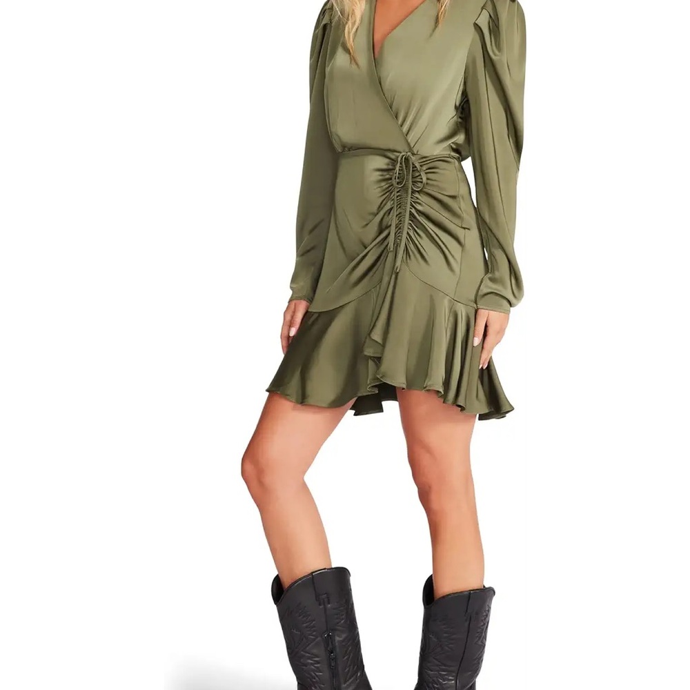 BB Dakota® by Steve Madden® Nyla Dress is a satin dress with a flounced hem.